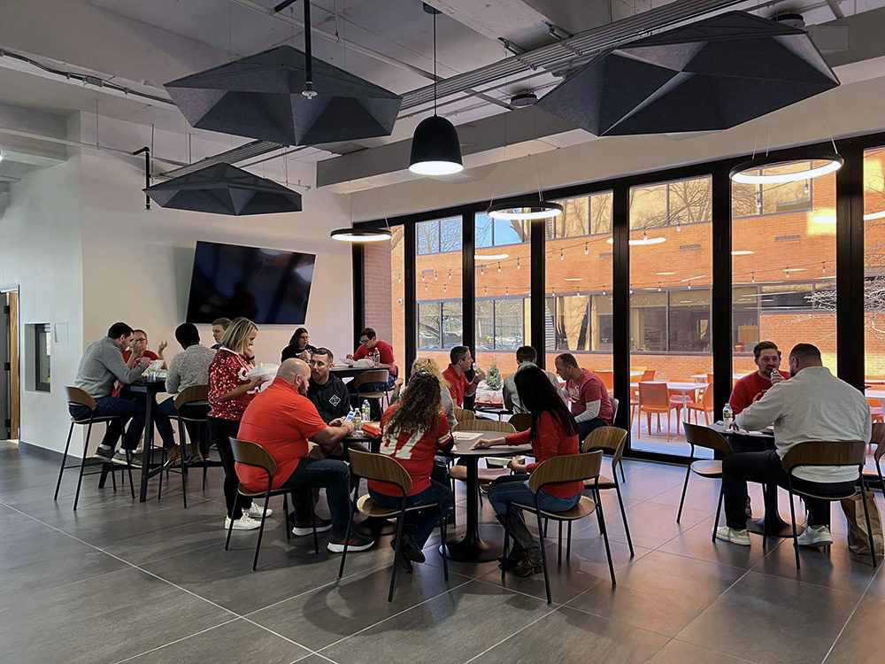 Team eating lunch on Red Friday in KC